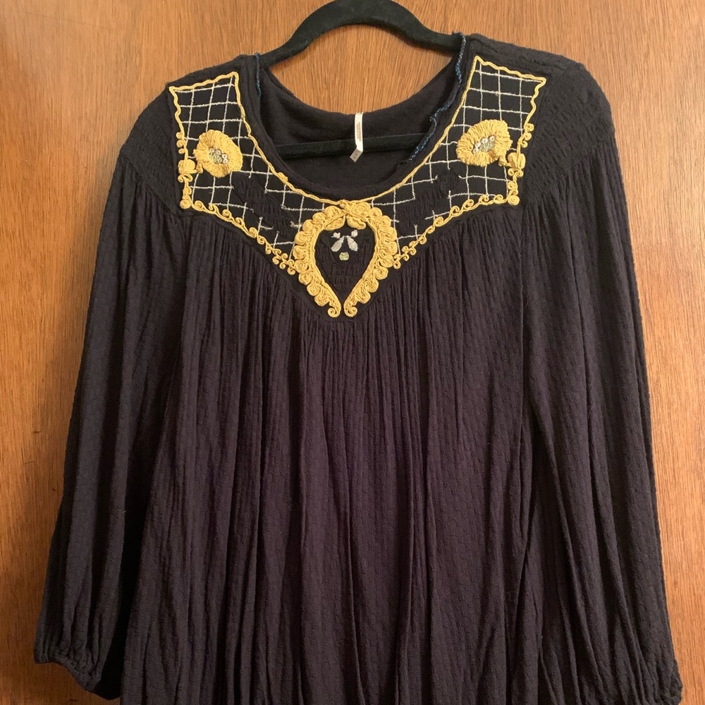 Free People blouse with embroidered neckline